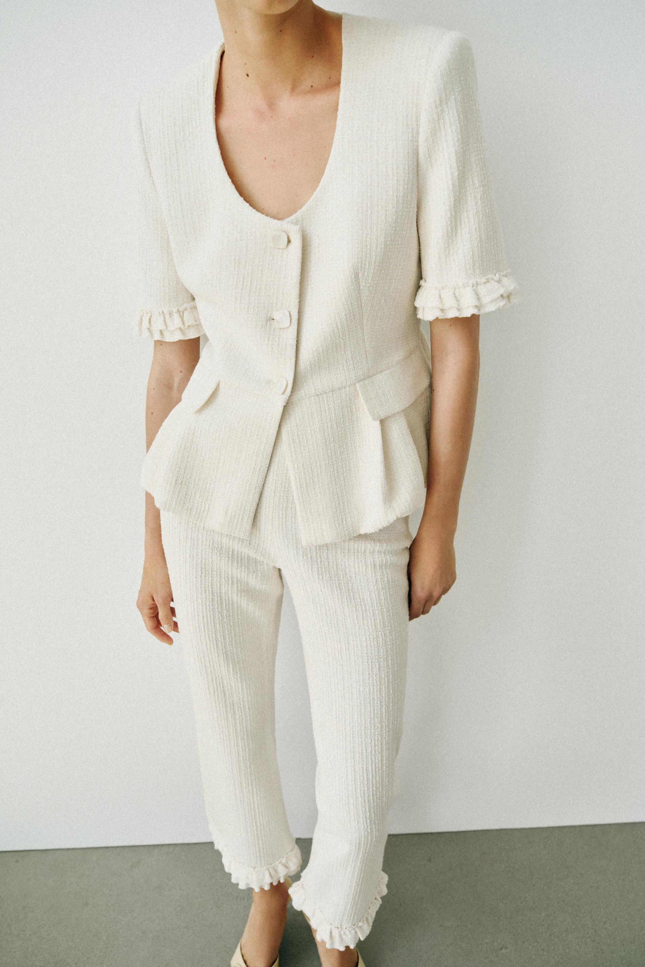 SHORT-SLEEVE RUFFLED PEPLUM JACKET